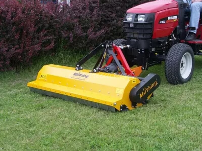 Front mounting for compact tractors